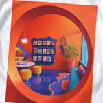White Wacky Pomo Library tee with an orange circular doorway framing a colorful reading room, blue sofa and books.