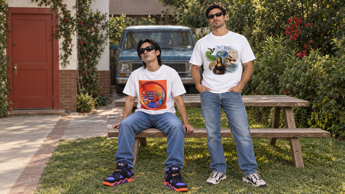 Two men in a sunny backyard wearing the white Library and Encyclopedia graphic tees